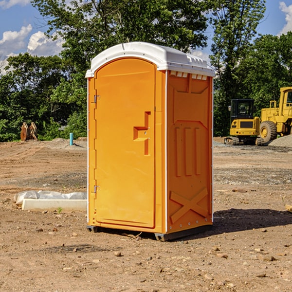 how often are the portable restrooms cleaned and serviced during a rental period in Adams County